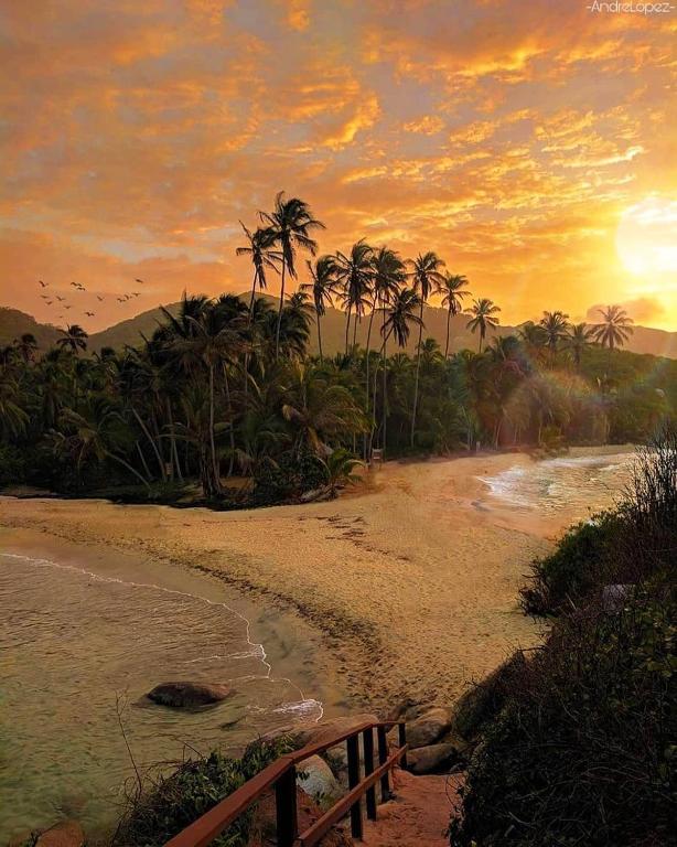 Sunset over a beach in Tayrona Park