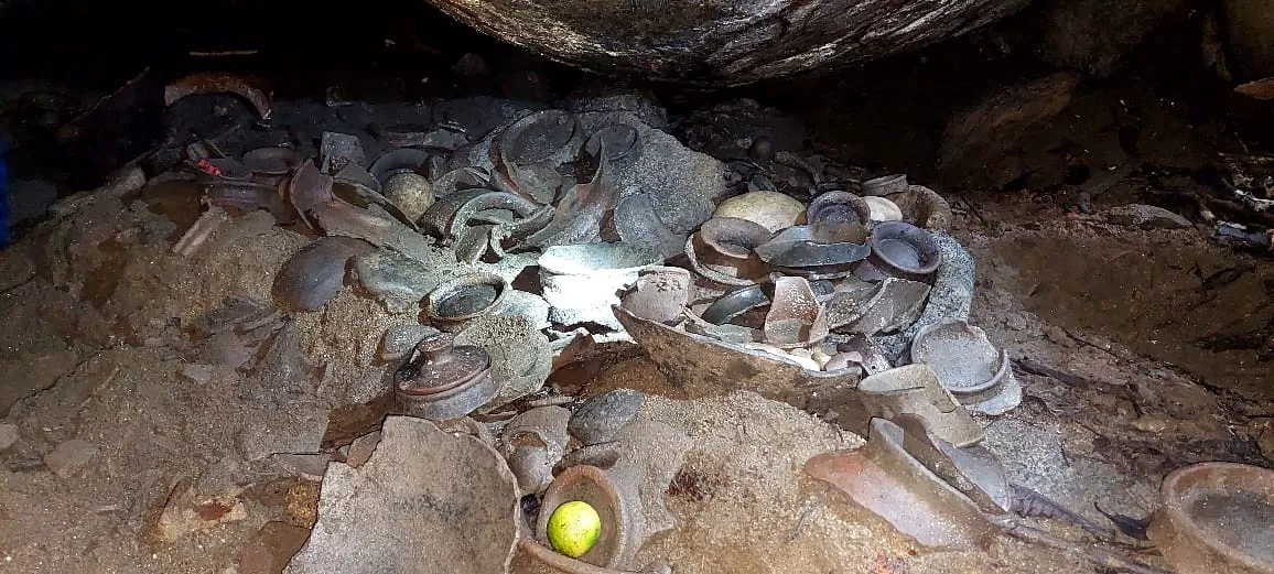 Original pottery and pieces inside the cave